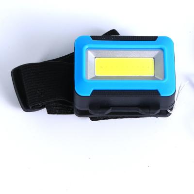 China Mini COB Camping Strong Light Super Bright Head Mounted LED Household Field Battery Ultra Light Small Headlight for sale