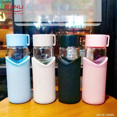 China Sustainable Double Wall Reusable Drinking Borosilicate Designer 300ML Glass Water Cup Bottle With Removable Sleeve for sale