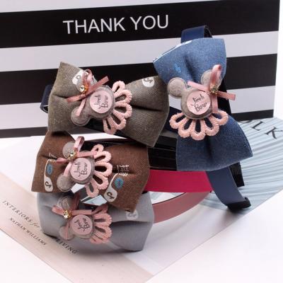 China New Cute Cartoon Style Children's Hair Accessories Cartoon Cloth Bow Hair Band Girl's Wide Hair Band for sale