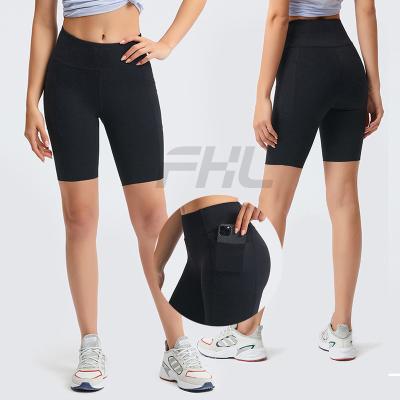 China Lulu 2022 Breathable Line Up Solid Color Second Skin Feeling Leisure Training Female Quick Dry Fitness Shorts Side Pockets Shorts for sale