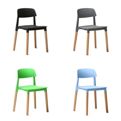 China Foldable Cheap Plastic Restaurant Chairs Modern Design PP Plastic With Wooden Leg Stackable Dining Chairs For Sale for sale