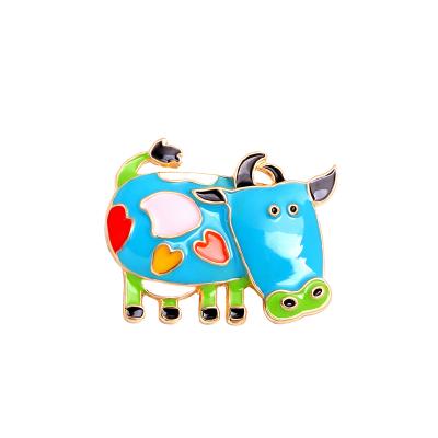 China High-end New Year's Suit Pin To Cow Brooch Alloy Drop Oil Brooch Pin Acrylic Cute Rhinestone Pearl Cartoon Brooch Gift for sale