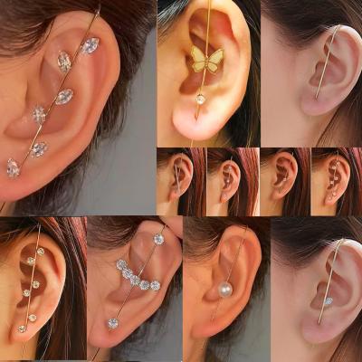 China Women's Cross Ear Clip Earrings New Fashion Casual/Sporty Creative Crystal Rhinestone Bone Ear Clip Earrings for sale