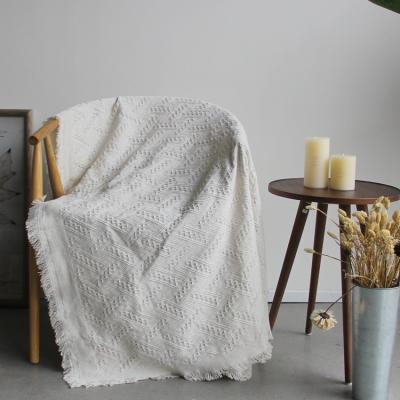 China Sofa Blanket Eco-friendly Pure White Color Cotton Knitted Bohemian Throw With Tassel Macrame for sale