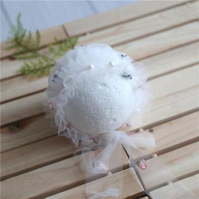 China Soft Cozy White Baby Lace Up Pearl Cute Beanie Newborn Photography Props Vintage Floral Newborn Sleepy Hood Hat for sale