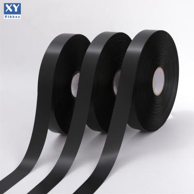 China Sustainable Wholesale Black 100%Polyester Double Sided Satin Fabric Ribbon Care Label White for sale