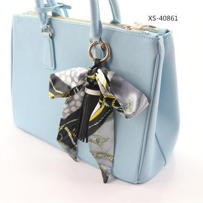 China Silky Faux Leather Tassel Handbag Decoration Bow Bow Tassel Key Chain Key Chain For Purse Charm for sale