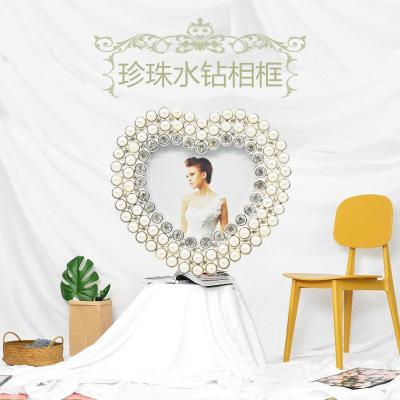 China Hot Selling Metal Photo Frames Metal Beads Luxury Decoration For Home for sale