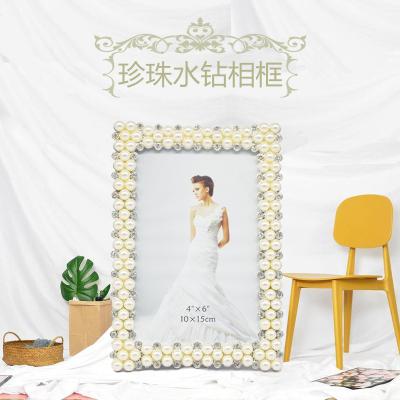 China High Quality Zinc Alloy Metal Bead Design Photo Frames Art Frame for sale