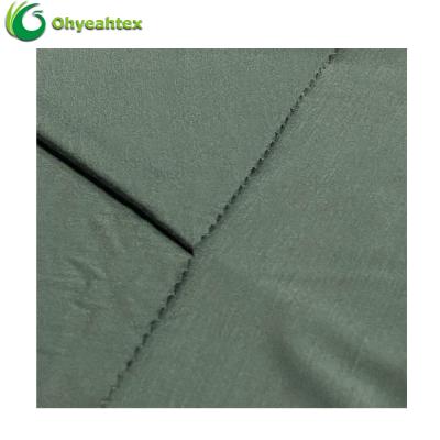 China Eco Friendly 100% Organic Spandex Stretch Bamboo Lyocell Fabric Sustainable Knitted Jersey For T Shirt for sale