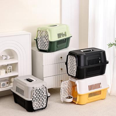 China Button Closure Candy Color Pet Air Transport Box Portable Dog Air Cage for Small Pets for sale