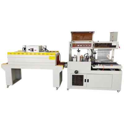 China Good Quality Food Shrink Packaging Machine Automatic Shrink Paper Wrapping Machine for sale