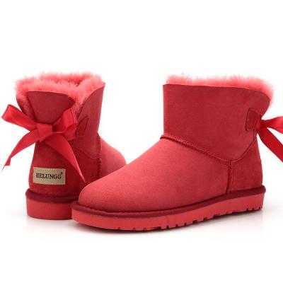 China Cheap wool snow shoes women's waterproof new model snow boots shoes factory direct sales warm handmade woolen shoes for sale