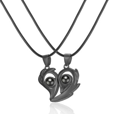 China Durable 2022 Fashion Customized Image Double Heart Projection Photo Pendant Necklace Magnetic Necklaces Custom Photo for sale