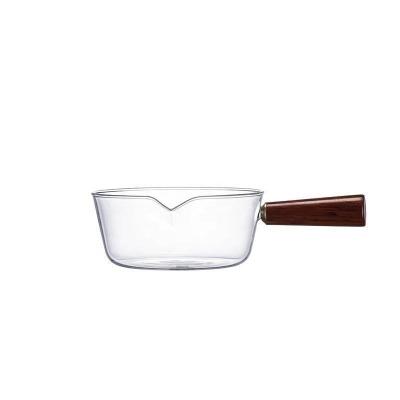 China 400ml 600ml High Quality Viable Clear Heat Resistant Glass Milk Pot Boiling Stew Pan Sauce Pot With Wooden Handle for sale