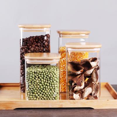 China Customized Sustainable High Borosilicate Square Glass Storage Food Airtight Jar With Bamboo Wooden Lid for sale