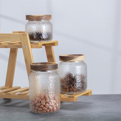 China Sustainable Household Bottle Glass Kitchen Transparent Canisters Jar With Lid Glass for sale