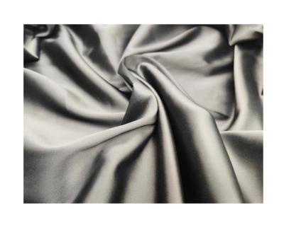 China 100% Polyester silk satin fabric cheap reliable quality soft shiny light workmanship for women sleepwear dress garment for sale