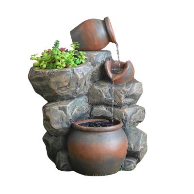 China Three tier spike pot and rocky water feature DC solar pump, solar panel with lithium battery and 4 warm white LEDs. garden landscaping for sale