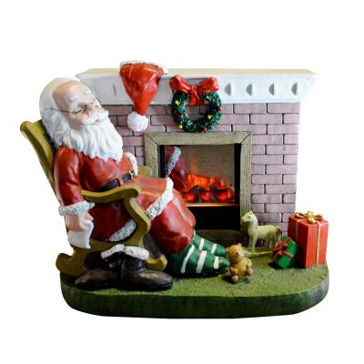 China COPYRIGHT Christmas Decoration Santa Claus Indoor Christmas Decoration By Electric Fireplace Inserted for sale