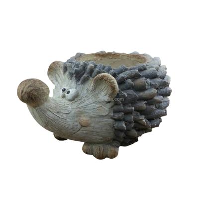 China Eco-friendly high quality fiberglass concrete hedgehog shape animal flowerpots for sale for sale