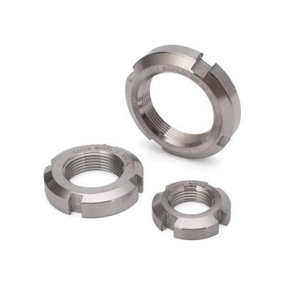 China Metric Measurement System 304 Stainless Steel Round Lock Coupling Knurled Slotted Hex Flange Nut for Automotive Industry for sale