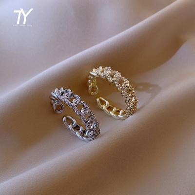 China 2022 FASHIONABLE New Unusual Zircon Design Twist Ring Gold Color Ring For Woman Fashion Korean Luxury Silver Wedding Party Jewelry for sale