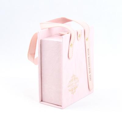 China Recycled Materials Hot Sale Pink Wedding Festival Souvenir Packaging Box with Belt Durable for sale