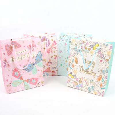 China Shoes & clothing Kids Lovely Bag Paper Shopping Gift Bag Logo Printing Customized Size with Ribbon Handle for sale