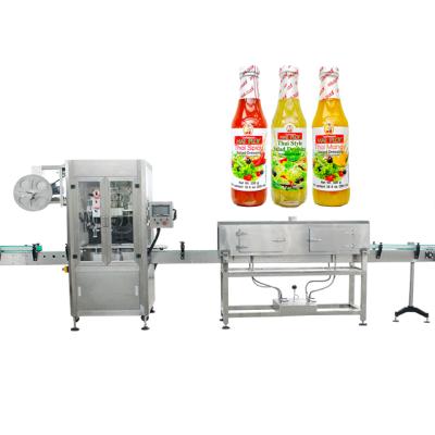 China Food master packing automatic shrink sleeve labeling machine for salad bottles shrink sleeve packing machine for sale