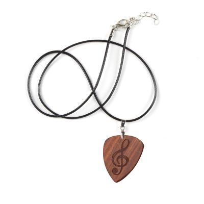 China Selection Exquisite Wooden Stand Guitar Bass Ukulele Plectrums Original Natural Guitar Music Lovers Gift Energinox Pendant Necklace for sale