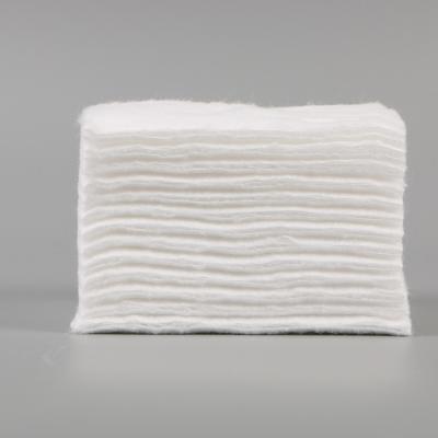 China 100% pure cotton hot sale professional cotton square pads use to clean absorbing liquid for sale