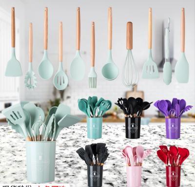 China Amazon Viable Hot Sale 12pcs Silicone Kitchenware Cooking Silicone Cooking Utensils Set With Wooden Handle for sale