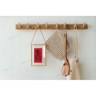 China Wall Mounted Stocked Rustic Natural Wood 3 Hooks Camphor Coat Rack Hangs Wall Wood Hooks For Living Room for sale