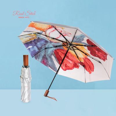 China Rain and Sun Protect 2021 Real Star New Arrival Tulip Flower Oil Printing 3 Fold Manual Open Coating Titanium Silver Umbrella for sale