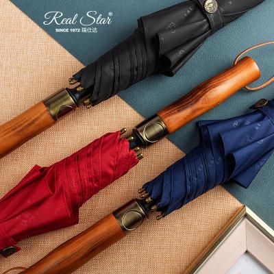 China Morden Star Luxury Custom Real Wood Handle Golf 210T RST Straight Umbrella Long 54 Inch Large Size Strong Windproof Umbrella for sale