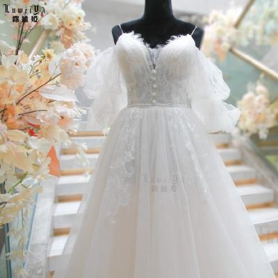 China New Arrivals Anti-Static Lace Up Applique With Chapel Train Halter Wedding Dress Off The Shoulder Plus Size Bridal Ball Gown for sale