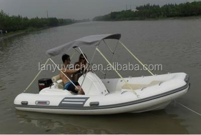 China Fiberglass CE certificate center console cabin hypalon china rib boat for sale