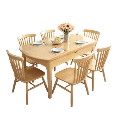 China Small Apartment Home Foldable Nordic Minimalist Dining Table And Chairs Modern Hotel Restaurant Cheap Solid Wood Dining Table for sale