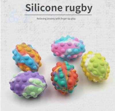 China Hot Sale Relife Amazone 3D Rugby Toy Silicone Bubble Ball of Educational Anxiety and Relieve Anxiety Toy for sale