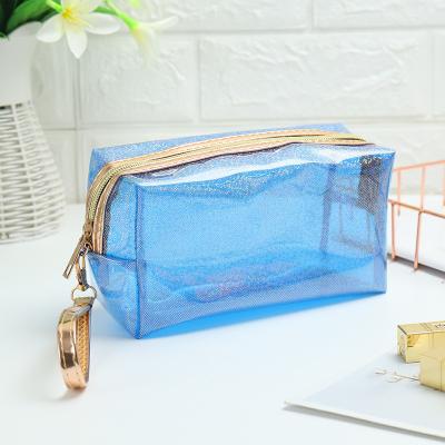 China Wholesale Fashion Designer Shiny Waterproof Clear White Toiletry Bag Small Pvc Cosmetic Make Up Case Bag For Ladies for sale