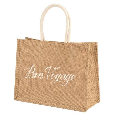 China Reusable Hot Selling Jute Handbag Large Capacity Logo Wedding Gift Foldable Custom Burlap Drawstring Bag for sale