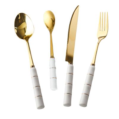 China YIJIA 4pcs/set Stainless Steel Style Viable Nordic Bamboo Pattern Ceramic Handle Flatware Flatware Set White Cutlery Set for sale