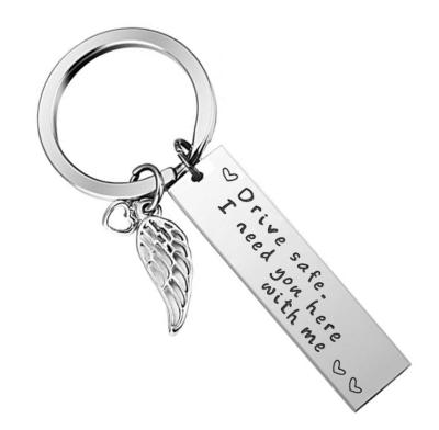 China Angle Wing Charm Engraved Drive Safe Friend Gift Key Holder I Need You Here With Me Stainless Steel Couples Keychains for sale