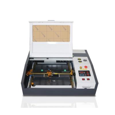 China HT-340 Water Cooled CO2 Laser Engraving Machine For Paper Wood Acrylic 300*400 mm for sale