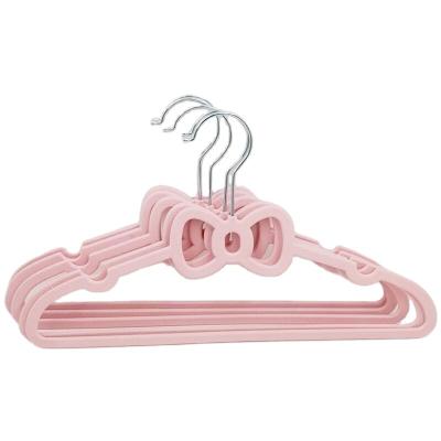 China Minimalist 1 Carton Bowknot Wholesale Decoration Ganchos Hanger Hanger Household Plastic Organizer for sale