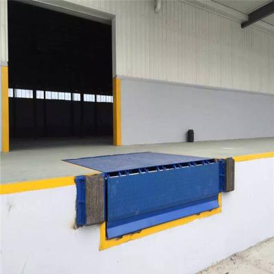 China Automatic Hydraulic Logistics Container Flat Plate Fixed Loading Dock Leveler With Bumper for sale