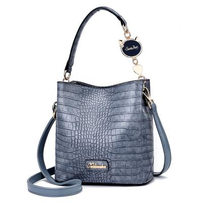 China Lady Fashion Hot Sale Ladies Solid Color Handbag Crocodile Pattern Toto Bucket Bag for sale