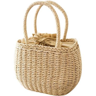 China Handwoven Beach Bag Female Fashion Vacation Basket Straw Vegetable Bag for sale