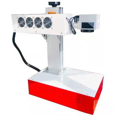 China Small CO2 Laser Marking Machine CO2 Laser Marking Machine CCD Focus Air-cooled Auto Fly CO2 Laser Marking Machine Expiry Date for sale